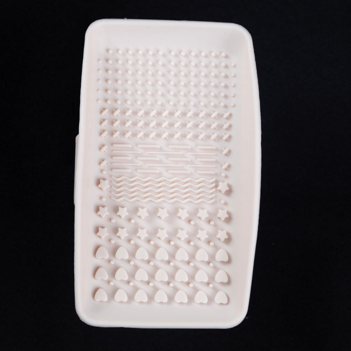 Cream brush cleaning pad